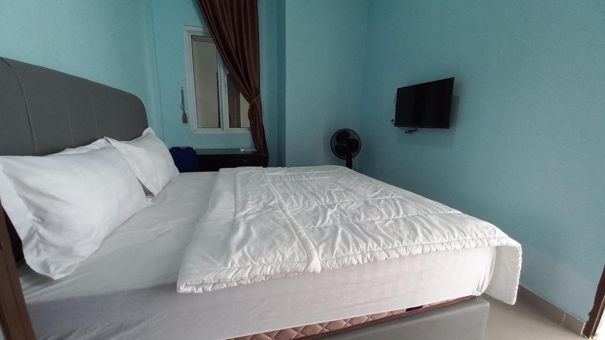 Spot On 93428 Pinus Jaya Syariahneartaman Amaryllis 2*
