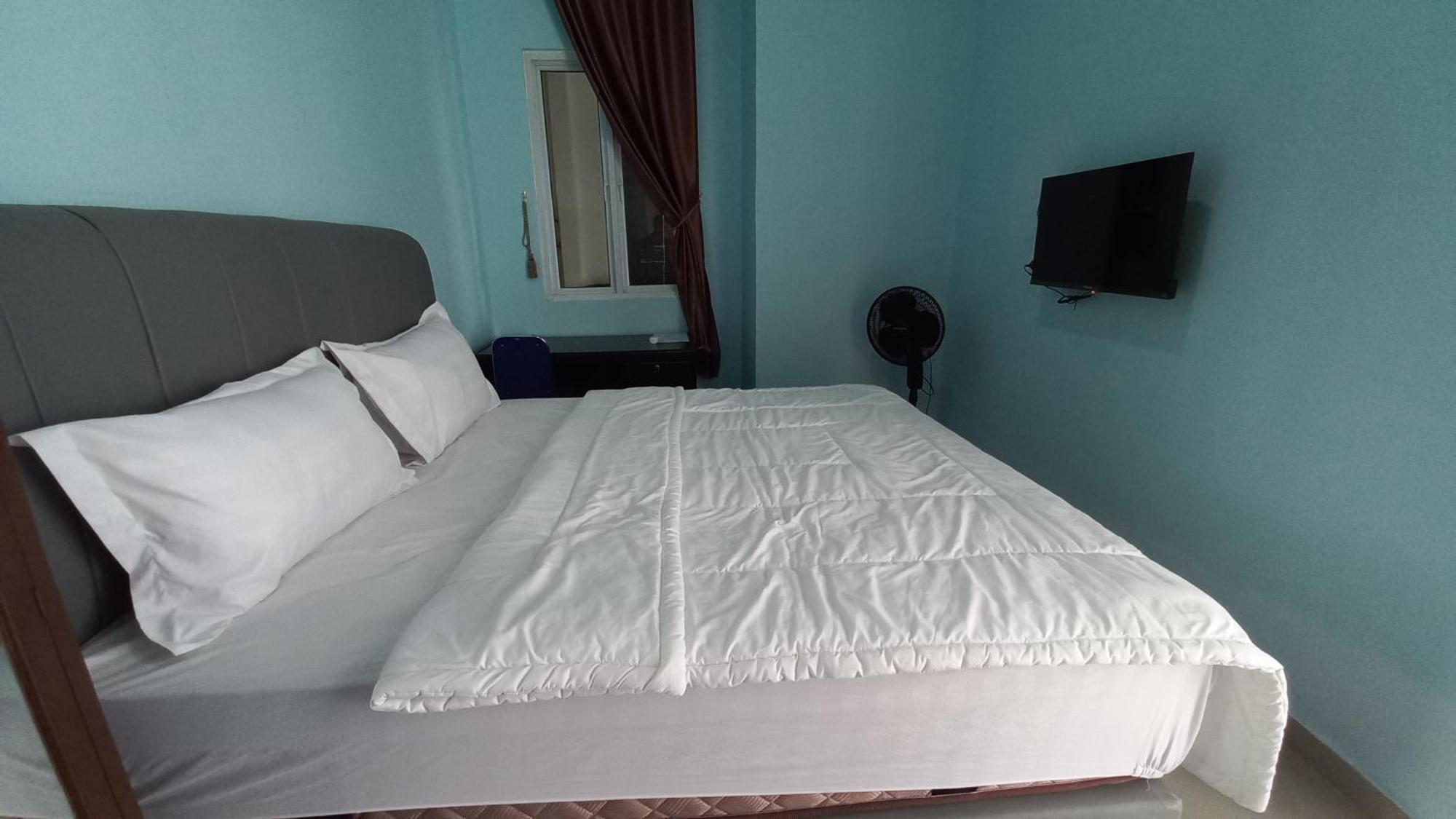 Spot On 93428 Pinus Jaya Syariahneartaman Amaryllis Hotel